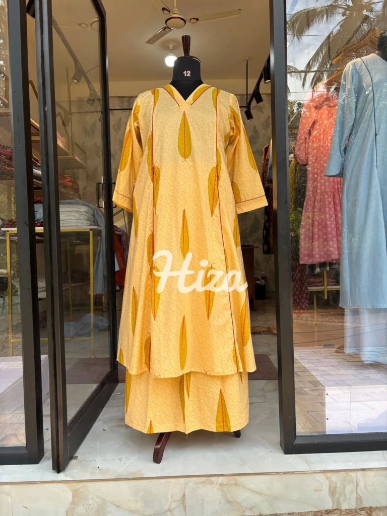 a dress form wearing a sandil colormaternity kurthi and palazzo online maternity waer in kerala