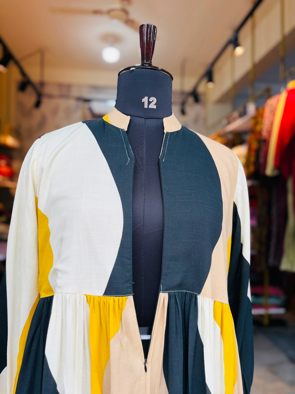 a near view of a two layer gown with center zip online maternity wear in kerala