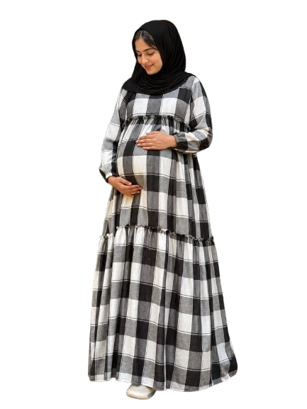 A pregnant women wearing a two layer maternity gown -online maternity store in kerala