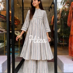 a young women wearing astrip co-ord set with feeding option-online maternity wear in kerala