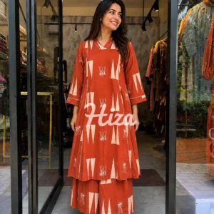 A women wearing a brick shade kurthi and palazzo nursing wear -online maternity wear in kerala