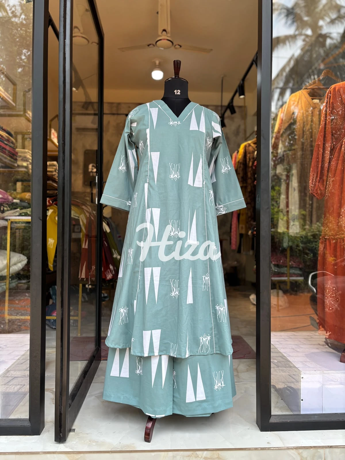 A dress form wearing a nursing codset online maternity wear in kerala