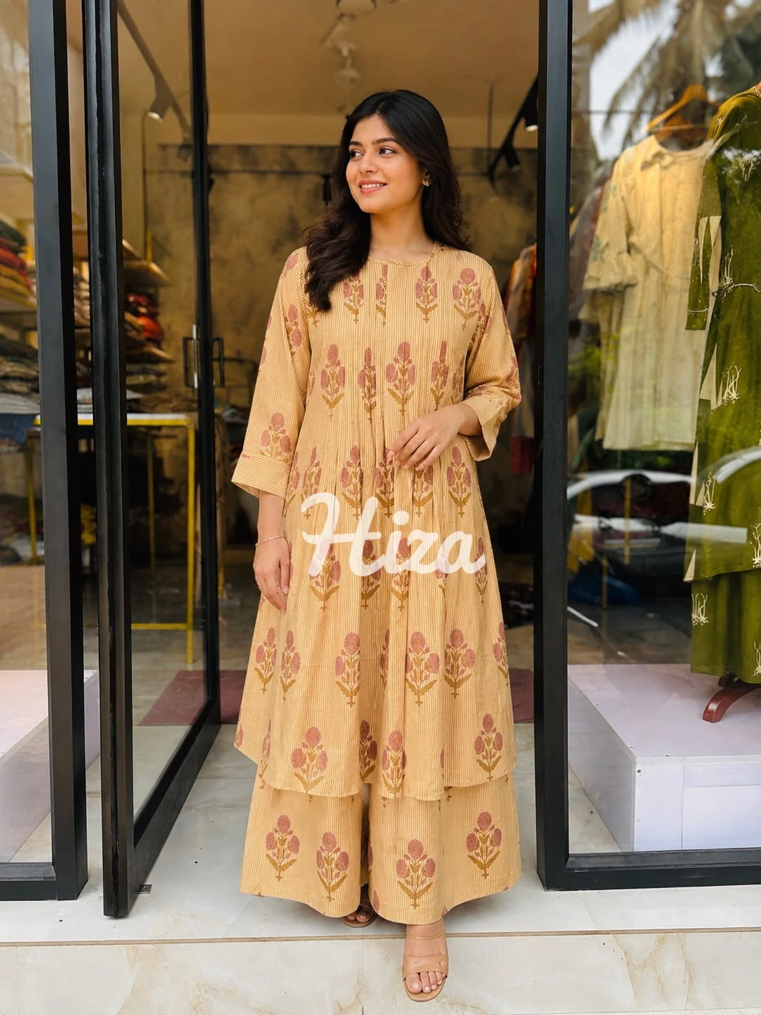 A women wearing a yock pleated comfortable codset-online maternity wear in kerala